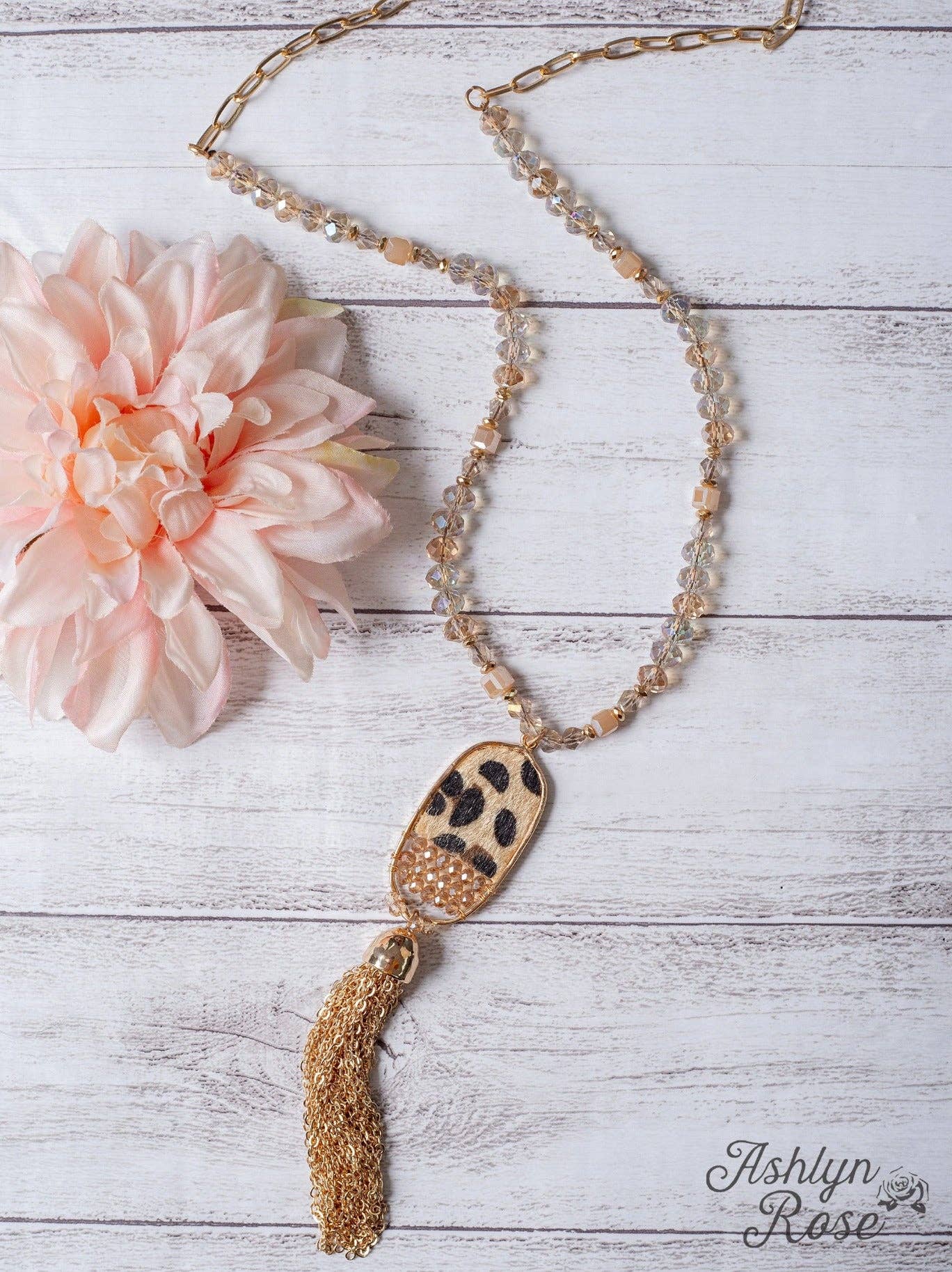 ALL THE DRAMA OVAL LEOPARD TASSEL GOLD PENDANT ON A IRIDESCENT CRYSTAL BEADED GOLD LINKED CHAIN NECKLACE: Gold / One Size