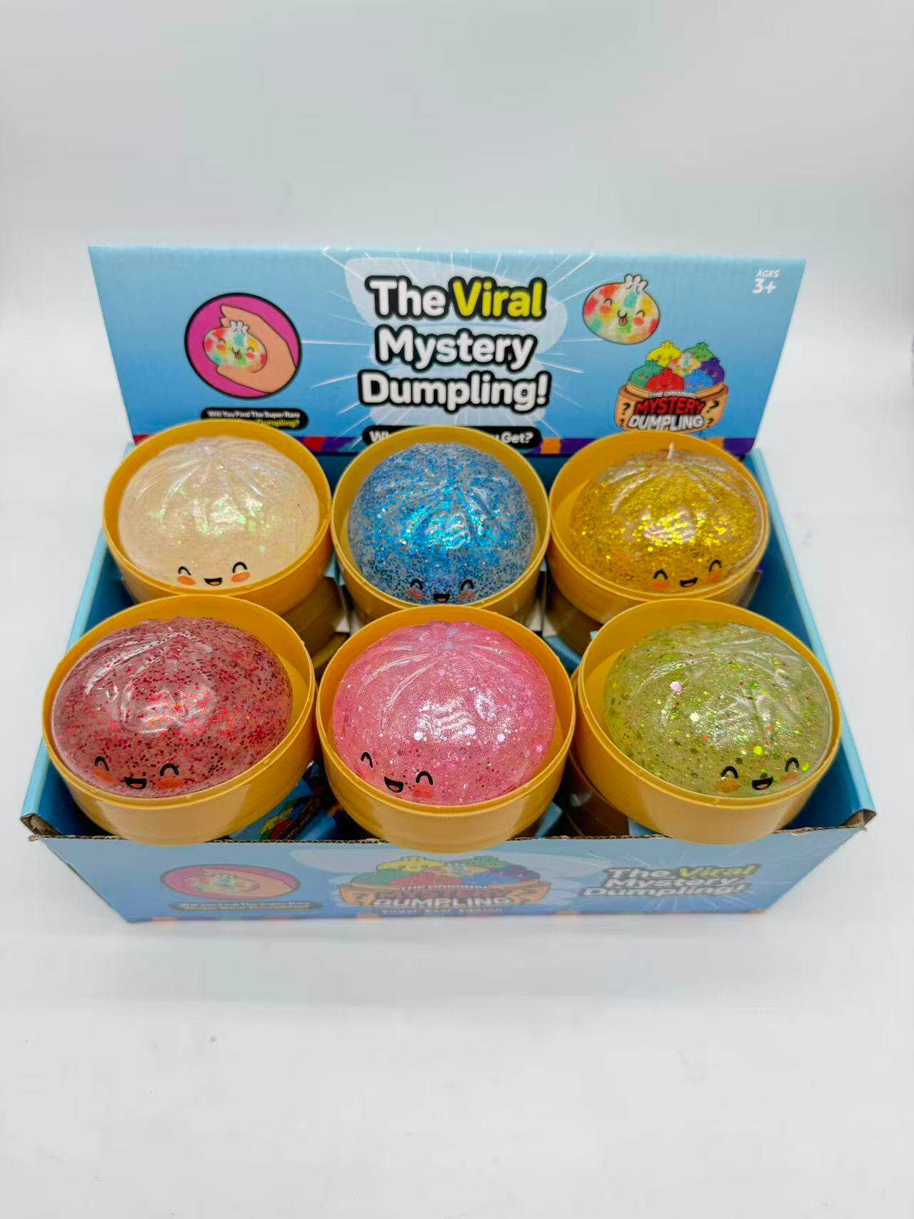 Glitter Dumpling Squishy Quick Rebound Fidget Stress Toy: TPR Dumpling Shape Squishy with Steamer Glitter Clear Shell Emoji Style
